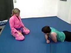 Mom teaches Jiu-Jitsu to...
